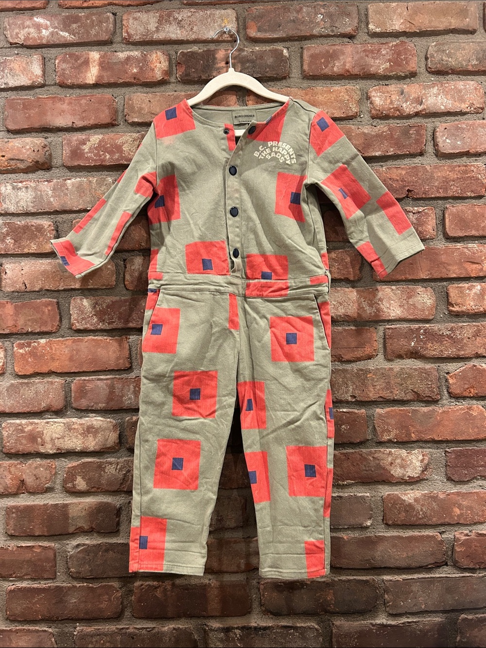 Bobo Choses Olive Green Jumpsuit with Coral & Navy Geometric Print